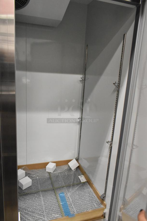 BRAND NEW 2025 Avantco 178A49FHC stainless steel commercial freezer, two-door, poly-coated racks, 115V, slight dented condition.