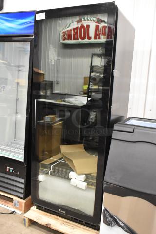 Brand new True CVM-27-HC glass door merchandiser cooler, 30" one section, poly coated racks, 115V, 1 phase, minor scratches.