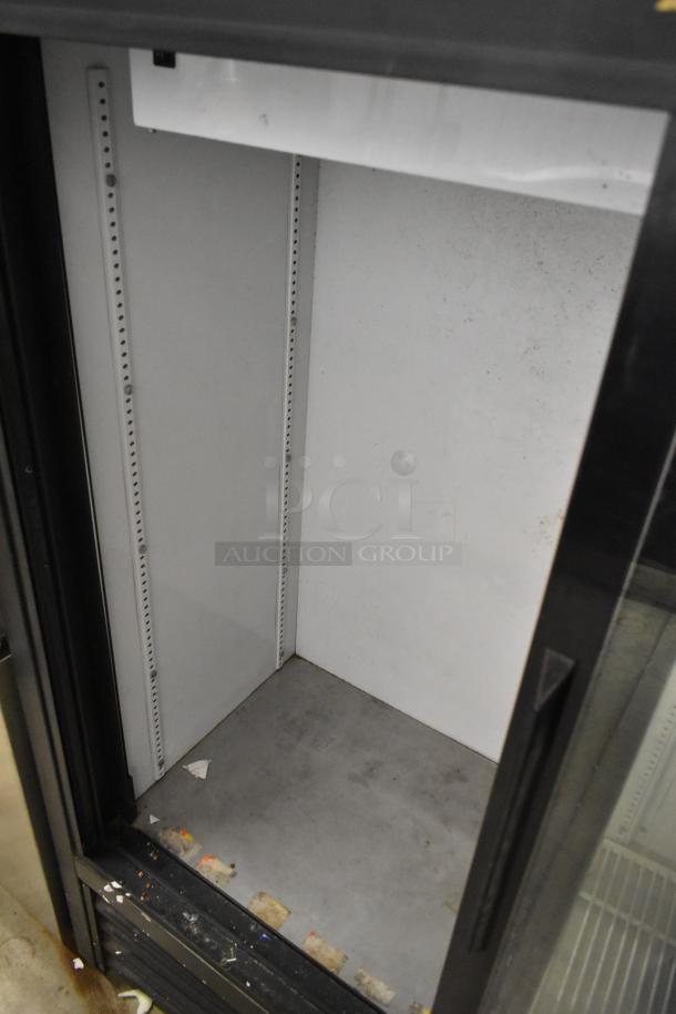 True GDM-41SL-54-LD cooler, metal, 2-door, commercial use, poly coated rack, 115V, 1-phase, interior view.