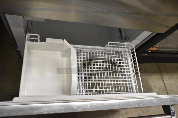 Viking stainless steel commercial reach-in cooler with freezer drawer, featuring 115 volts, 1 phase. New condition.