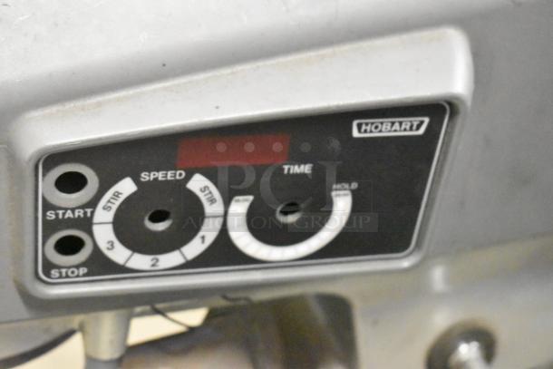 Hobart Legacy HL200 dough mixer control panel, featuring speed and time settings. Visible brand label. Used condition.