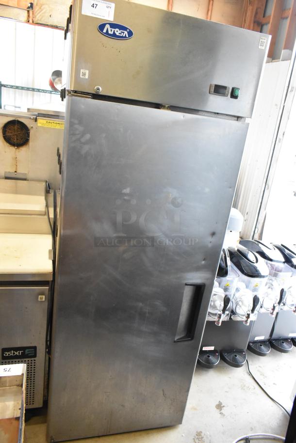 2019 Atosa MBF8001GR stainless steel commercial single door reach-in freezer, minor scratches, with Atosa logo visible.
