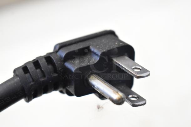 Close-up of the power plug for the Atosa MBF8001GR commercial reach-in freezer, 115 volts, 1 phase.