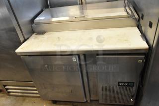 Asber APTP 46 stainless steel pizza prep table, used condition, with two doors. Model APTP 46, 115V, 1 phase.