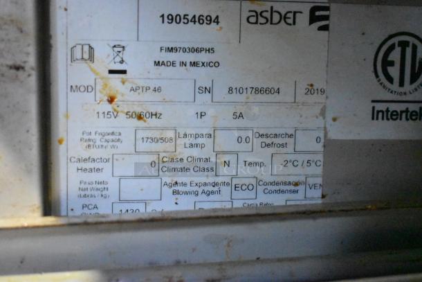 Asber APTP 46 stainless steel commercial pizza prep table label, 115V, 1 phase, made in Mexico, model details visible.