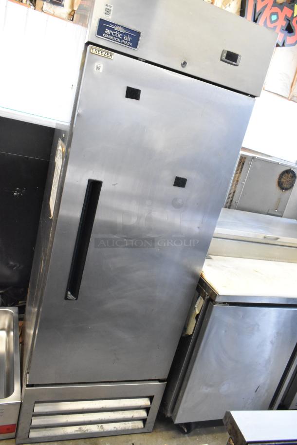 Arctic Air AF23Z stainless steel commercial freezer, single door, poly coated racks, 115 volts, excellent condition.