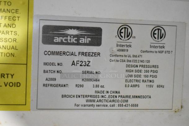 Arctic Air AF23Z commercial freezer label, showing model number, serial number, design pressures, and electric rating.