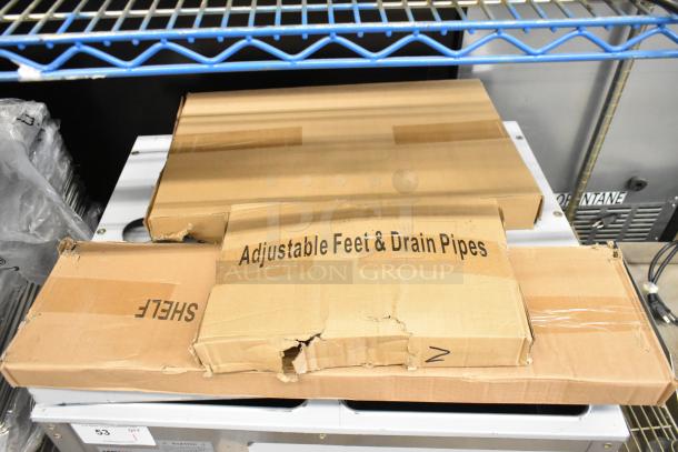 Brand new ServIt 423EST2WSPB stainless steel steam table in box. Features include adjustable feet and drain pipes.