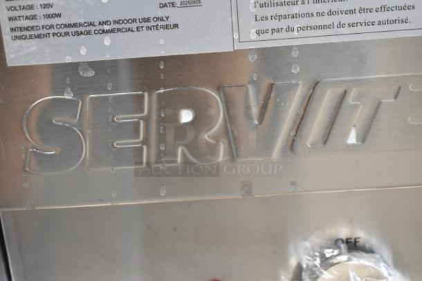 Brand new ServIt 423EST2WSPB stainless steel steam table, 120V, with markings and partial enclosure.