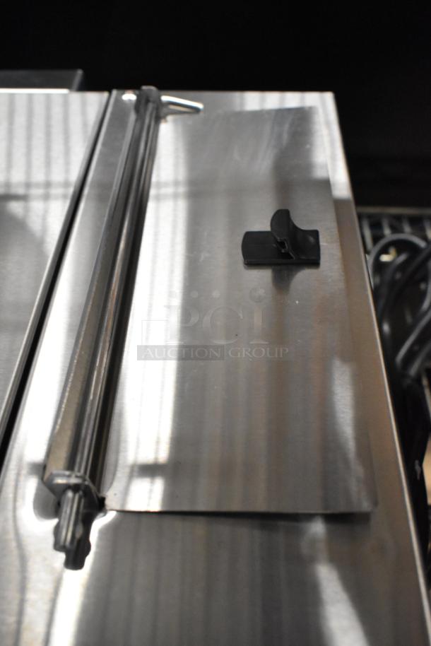 Brand new Avantco 177QS1800SS stainless steel countertop tortilla steamer with scratches and dents. 120V, 1 Phase.