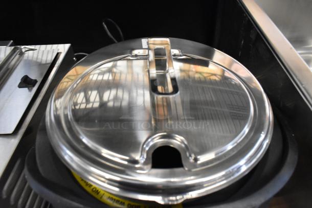 Brand new Vollrath 74701D Mirage stainless steel 7 Qt. drop-in induction rethermalizer, 120 volts. Scratch and dent condition.