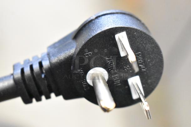 Close-up of the power plug for Avantco 177RCB124 rice cooker, labeled with voltage and model markings.