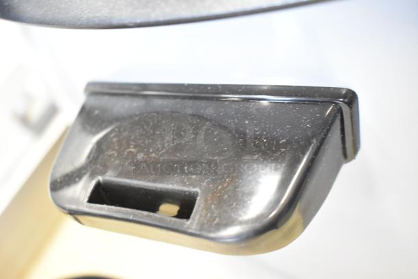 Avantco 177RCB124 stainless steel rice cooker handle detail, brand new, minor scratches, 124 cup capacity, removable lid.