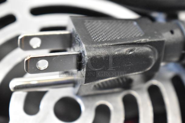 Close-up of a power plug for Avantco 177IC1800 Induction Range, showing a standard two-prong configuration.