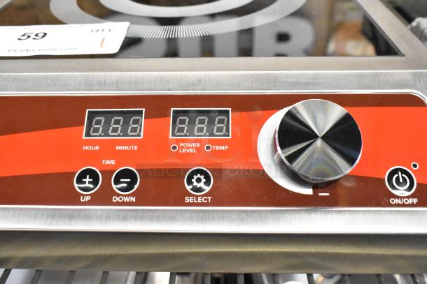 Brand new 2025 Avantco 177IC1800 induction range. Stainless steel, countertop model, controls visible, 120V, 1 phase.