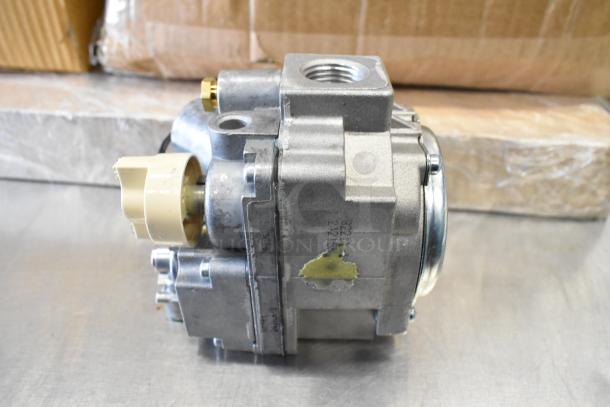 Brand new MM24179A unit with spray nozzle attachment, scratch and dent, visible label markings, industrial-grade component.