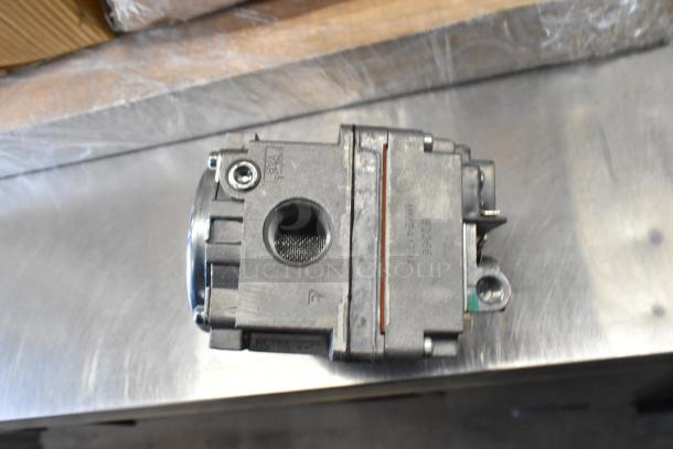 Brand new spray nozzle attachment and 82266 MM24179A unit. Slight dent. Model markings visible.