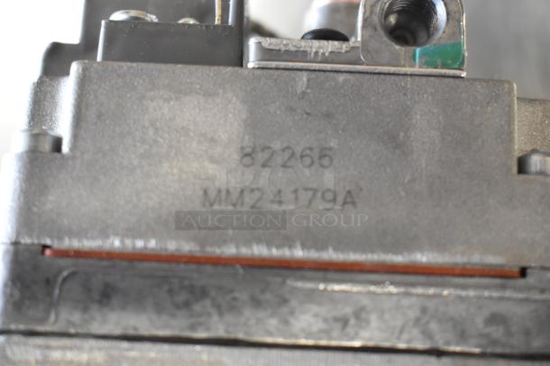 Brand new scratch and dent item featuring Spray Nozzle Attachment Head and Unit 82266 MM24179A markings visible.