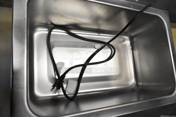 Brand new ServIt 423FW150 stainless steel countertop food warmer, 12"x20", electric, digital controls, minor dents.