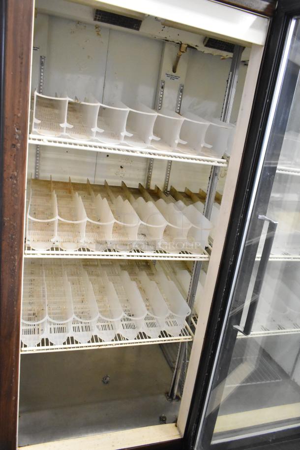 Beverage Air 3-door reach-in cooler, metal exterior, poly coated racks, 115V, 1 phase, used condition.