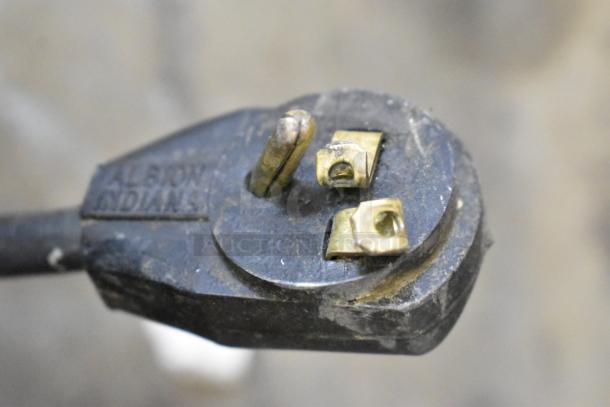 Beverage Air commercial 3-door cooler merchandiser with poly-coated racks, 115 volts, 1 phase, metal exterior.