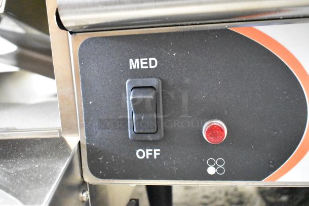 Control panel of a brand new Nemco 6311-4-240 hot plate, showing a switch with "MED" and "OFF" settings.