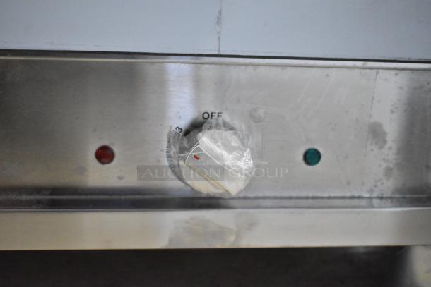 Brand new ServIt 423EST3WO stainless steel steam table with control panel, 120 volts, visible packaging on dial.