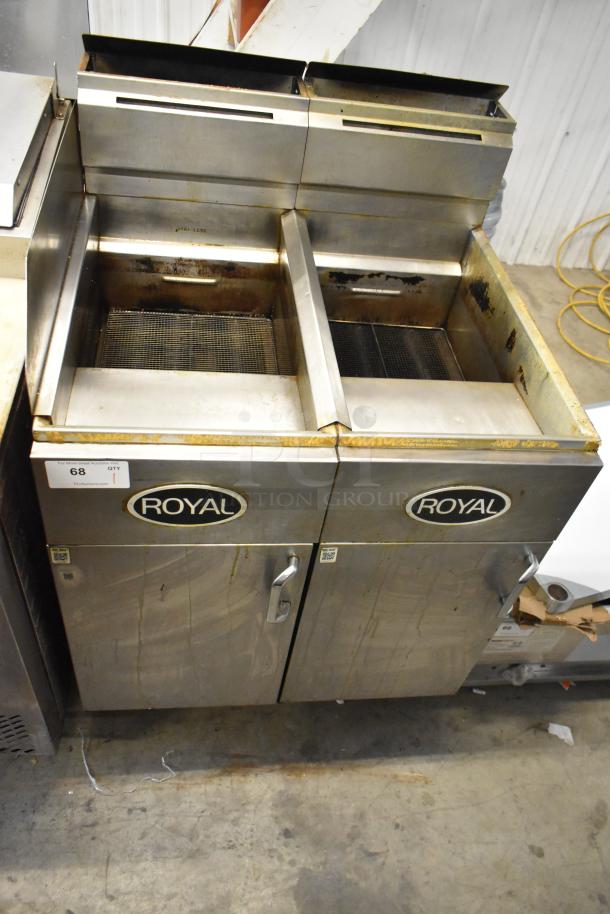 Royal RFT-50 stainless steel 2-bay deep fat fryer, propane gas-powered, commercial use, visible wear, Royal branding.