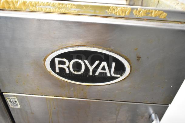 Royal RFT-50 stainless steel 2-bay deep fat fryer, propane gas powered, commercial floor model. Visible wear, used condition.