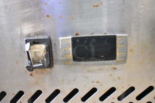 2018 Atosa MPF8202GR stainless steel pizza prep table, control panel view, with visible wear. Model: Dixell.