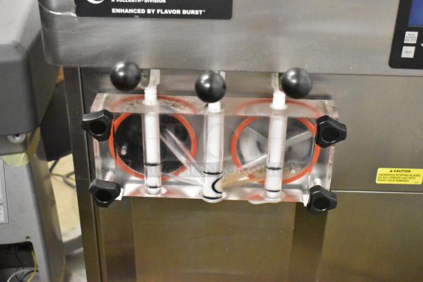 Stoelting F131-38I2 stainless steel soft serve machine, 2 flavors with twist, countertop model, 208-240V, 1 phase.