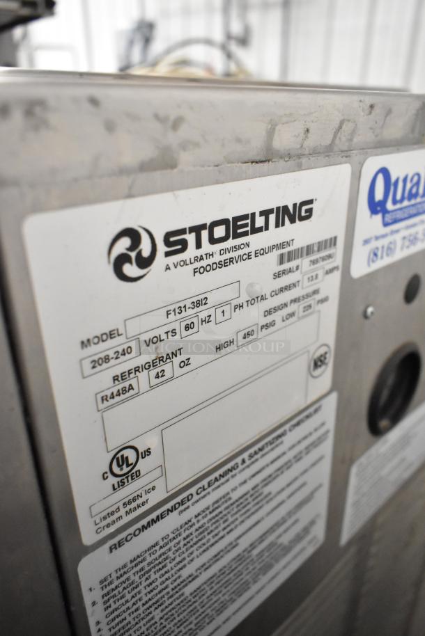 Stoelting F131-38I2 stainless steel soft serve machine, 2 flavors plus twist. 208-240V, 1 phase. Includes model and voltage label.