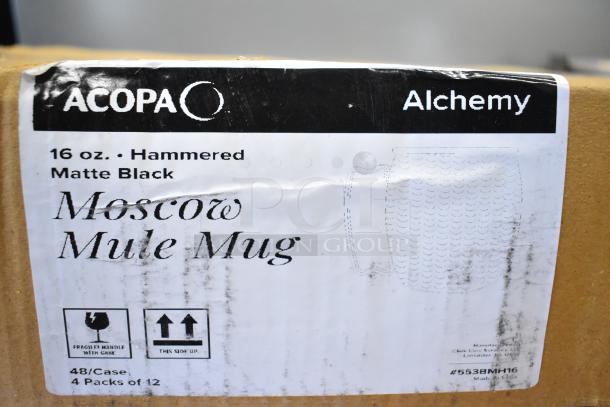 Acopa Alchemy 16 oz. Hammered Matte Black Moscow Mule Mug box, featuring product label with handling instructions.