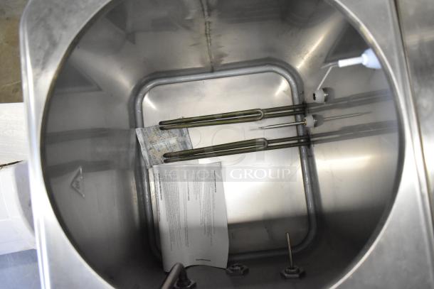 Brand new Avantco 177HWD10D stainless steel 10-gallon hot water dispenser. Interior view showing heating elements and manuals.
