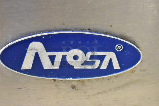 Atosa logo on the stainless steel surface of the 2018 MGF8402GR commercial cooler. Model for undercounter use.