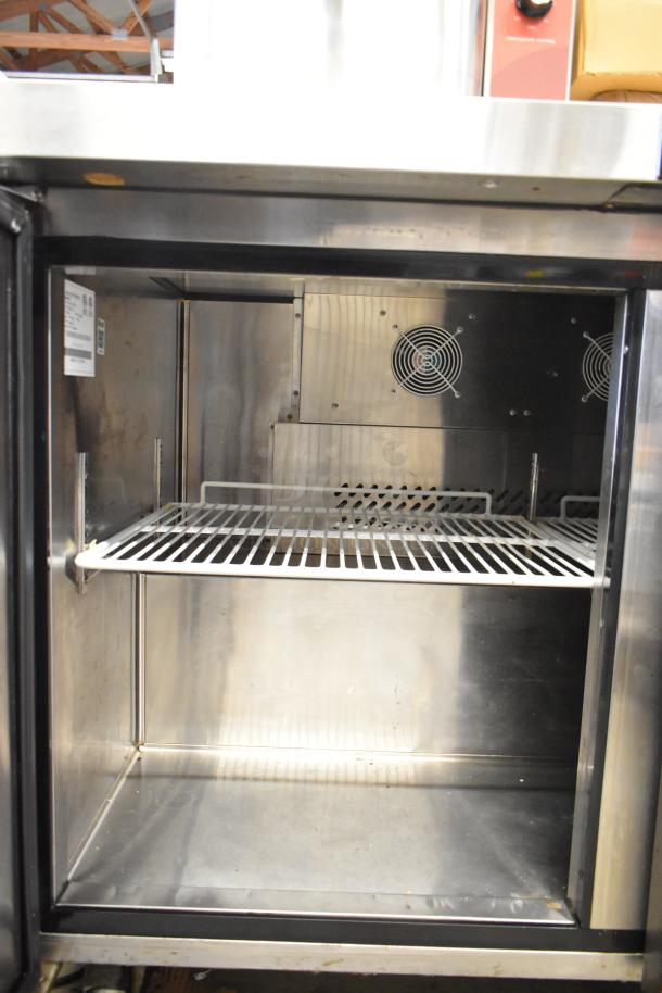2018 Atosa MGF8402GR stainless steel 2-door undercounter cooler with commercial casters, 115V, 1 phase, clean interior.