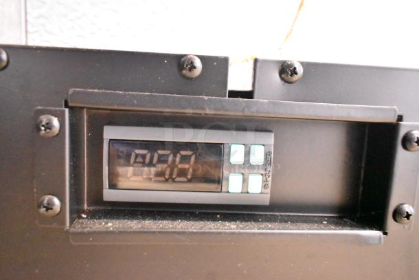 Digital temperature display panel on Atosa 178AU48FHC stainless steel commercial undercounter freezer, showing temperature settings.