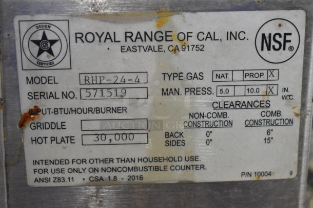Stainless steel Royal RHP-24-4 propane gas 4-burner range, 30,000 BTU, commercial use, model details and specifications tag shown.