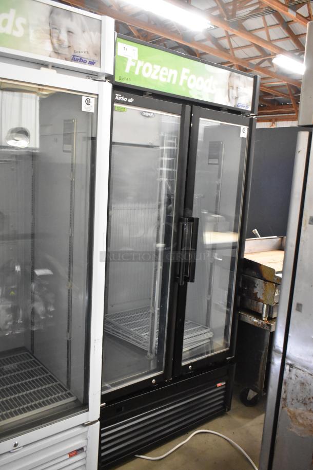 Turbo Air TGF-35SDB-N 2-door freezer merchandiser, metal frame, poly-coated racks, 115V, 1 phase, clean, good condition.