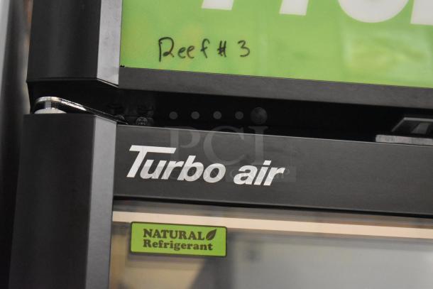 Turbo Air TGF-35SDB-N commercial freezer, metal, 2-door reach-in with poly-coated racks, natural refrigerant label.