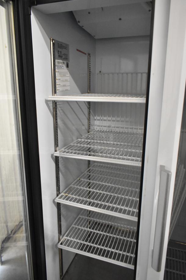 Turbo Air TGF-35SDW-N 2-door freezer merchandiser with poly coated racks, metal construction. 115V, 1 phase.