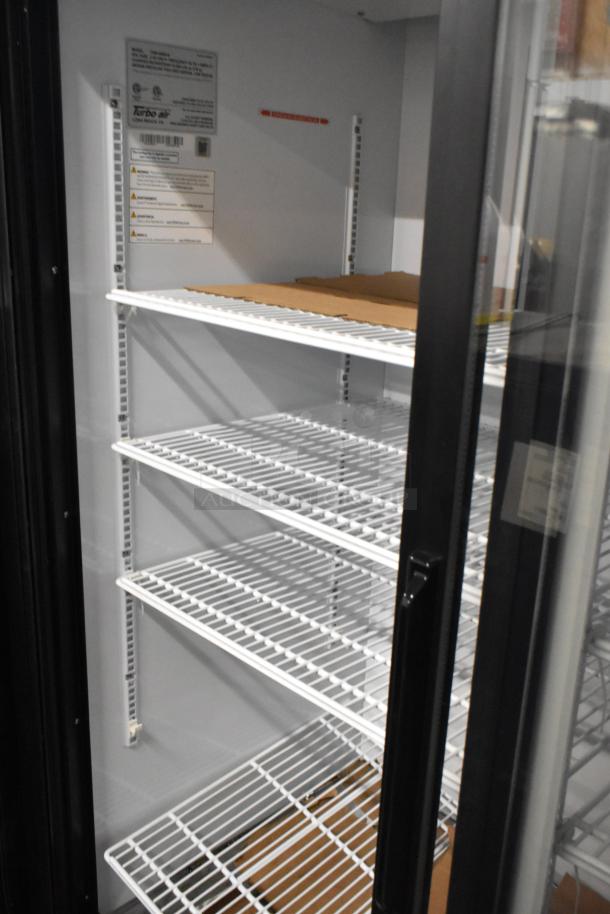 Turbo Air TGM-48RB-N cooler, 2-door metal, poly-coated racks, 115V, 1-phase; interior view with label details.