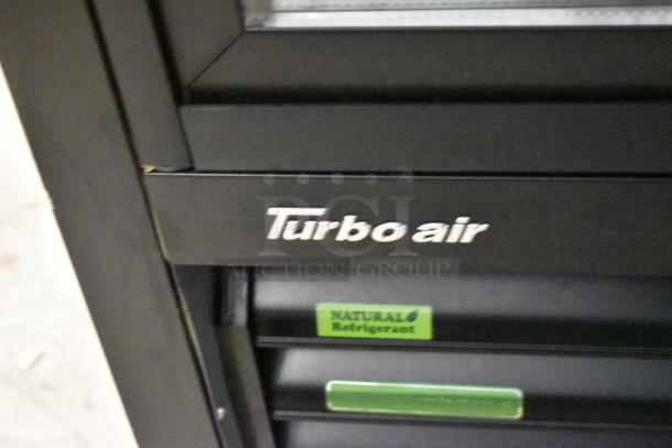 Turbo Air TGM-48RB-N 2 Door Reach In Cooler, black metal finish, natural refrigerant label, 115V, 1 Phase.