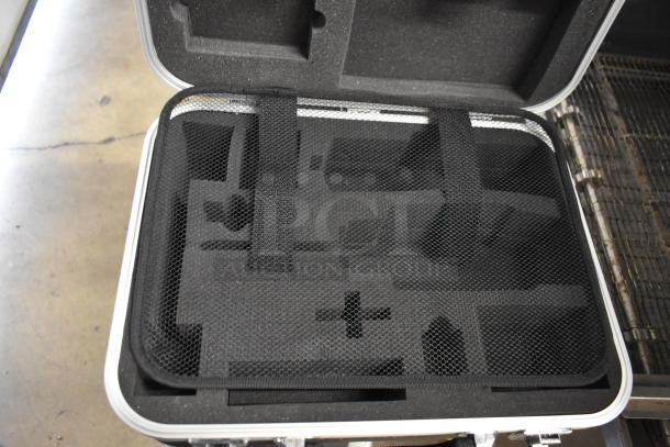 Rae Systems hard case with custom foam interior, mesh netting, shown open, excellent condition, durable for equipment storage.