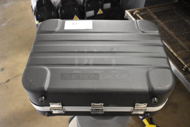 Rae Systems hard case, black with textured surface, sturdy latches, in good condition. Visible label marked "81."