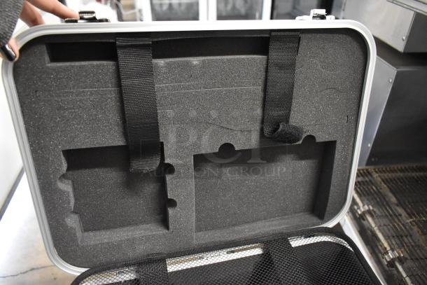 Rae Systems hard case with foam inserts and Velcro straps. Excellent condition, designed for secure equipment transport.