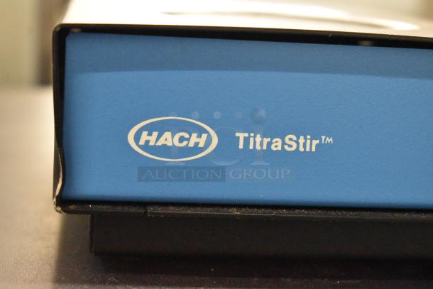 Hach TitraStir Stir Plate, blue, 115 volts, 1 phase, with logo. Tabletop design, used in laboratory settings.