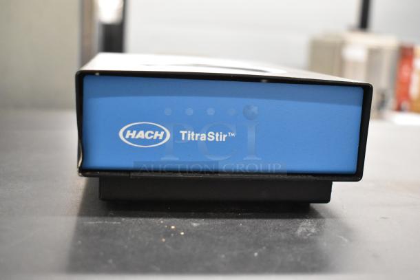 Hach TitraStir Stir Plate, blue color, 115 volts, 1 phase, in good condition.