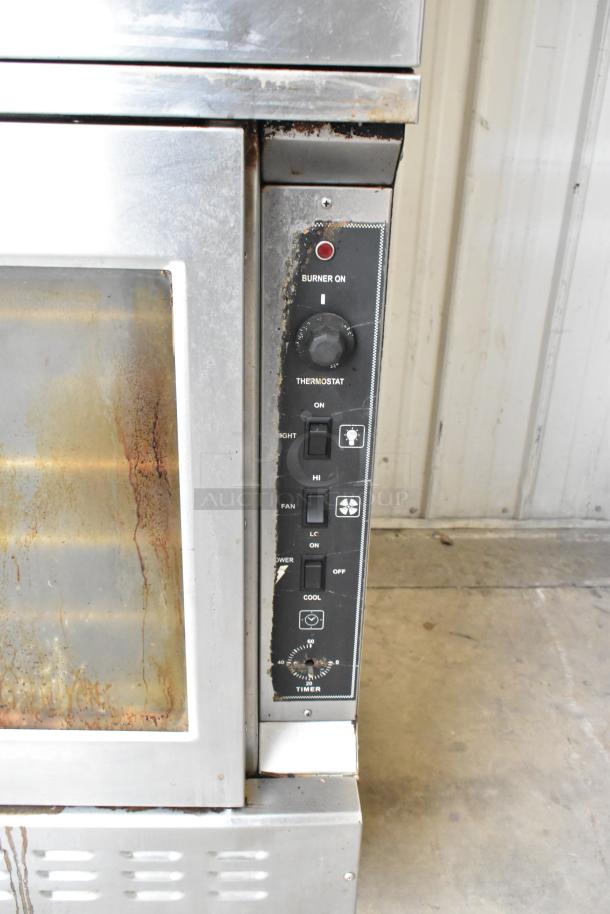 Royal RCOD-1 stainless steel commercial convection oven with view-through door and thermostatic controls on casters.