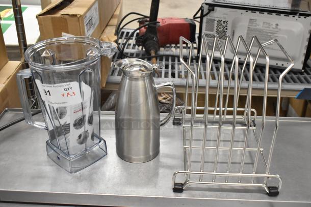 Three items: metal drying rack, stainless steel pitcher, poly blender pitcher. Auction label "3 times your bid!" visible.